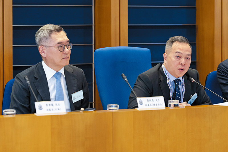 The Commissioner (right) briefs the District Fight Crime Committee on the law and order situation in 2025.